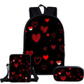 Black backpack with red heart patterns on a white background